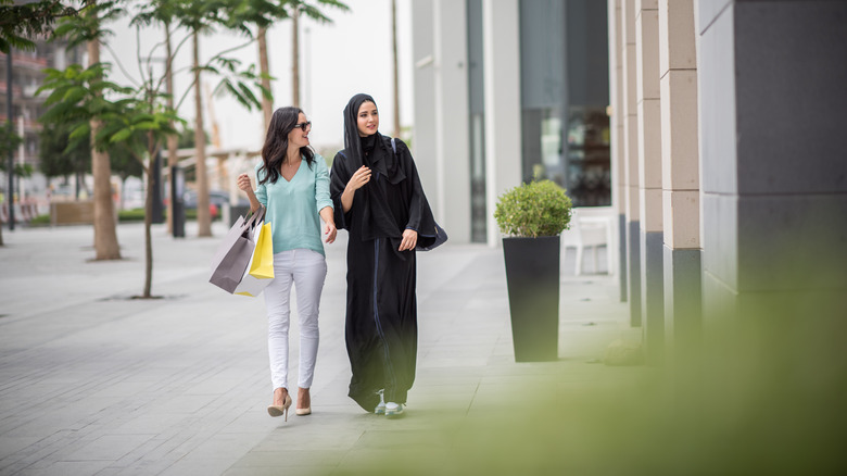 two women walking on Dubai street