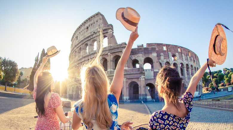 Girls riding bikes in Rome