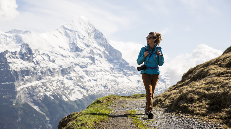 Woman hiking Swiss alps