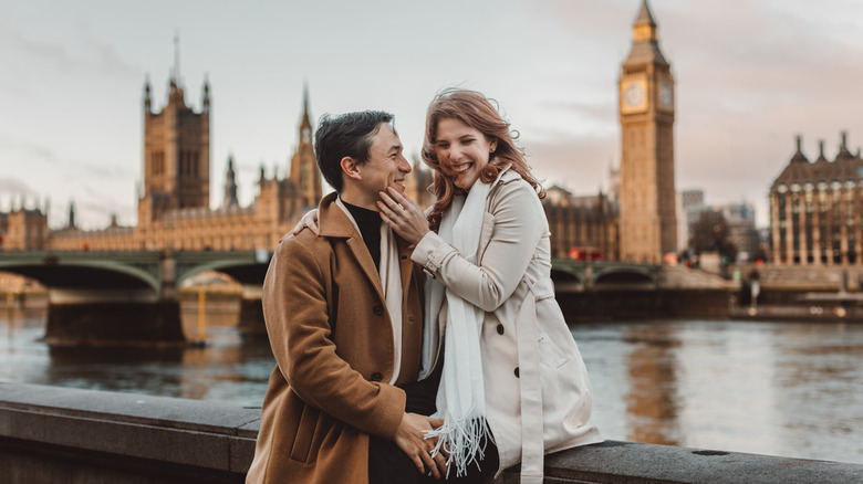 Couple wearing neutral colors, London