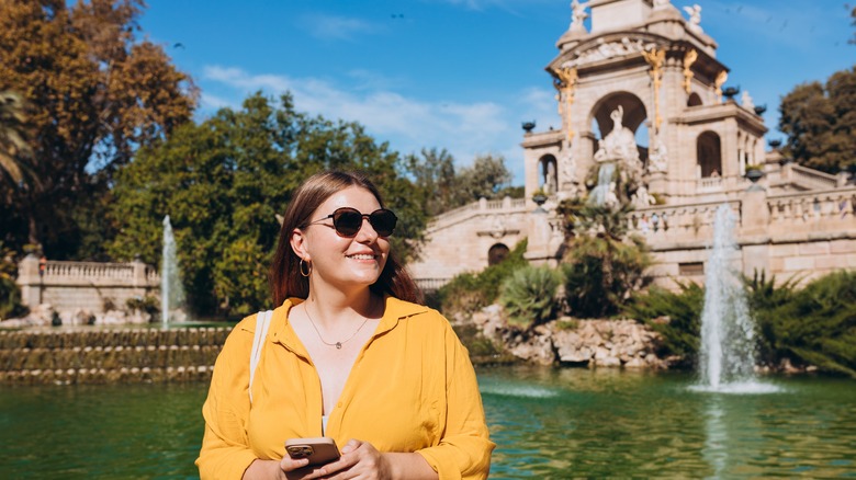 tourist at fountain in Barcelona