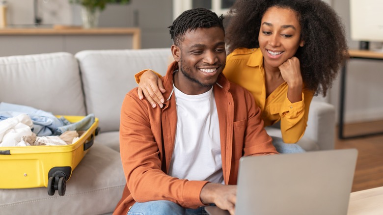 couple booking tickets online