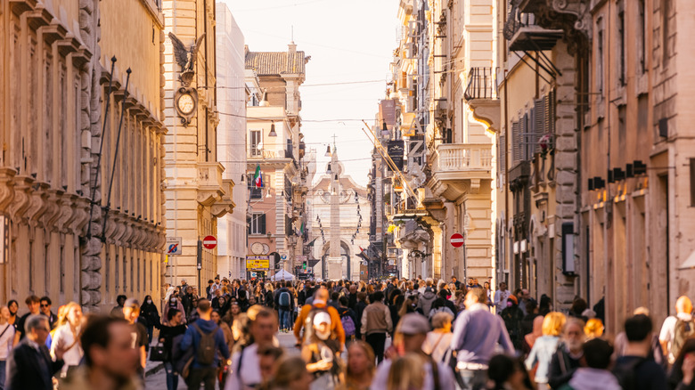 Crowds walking in the streets of Rome