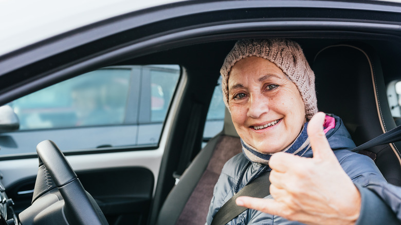 granny using the Shaka hand gesture