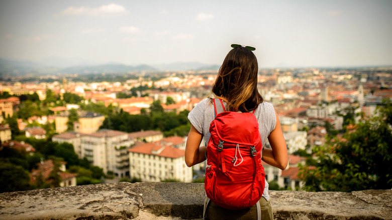 Woman with backpack in Italy