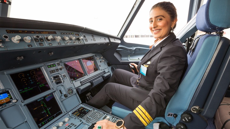 female pilot in the cockpit