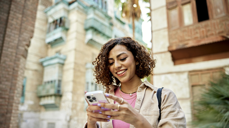 smiling woman on cellphone 