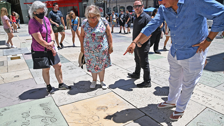 Tourists seeing handprints in LA