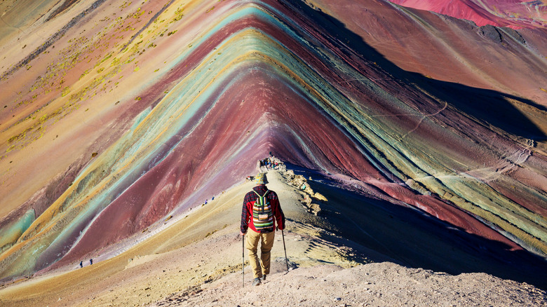 hiker at Rainbow Mountain