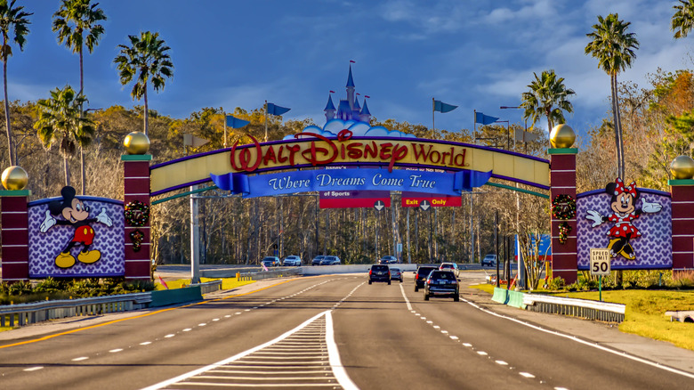 Entrance sign above road at Walt Disney World