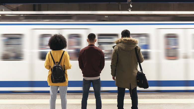 People waiting on metro platform