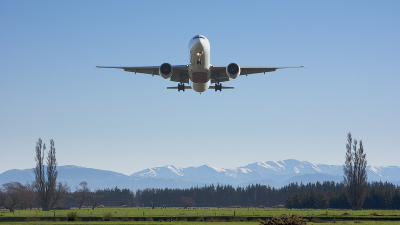 An airplane leaving New Zealand