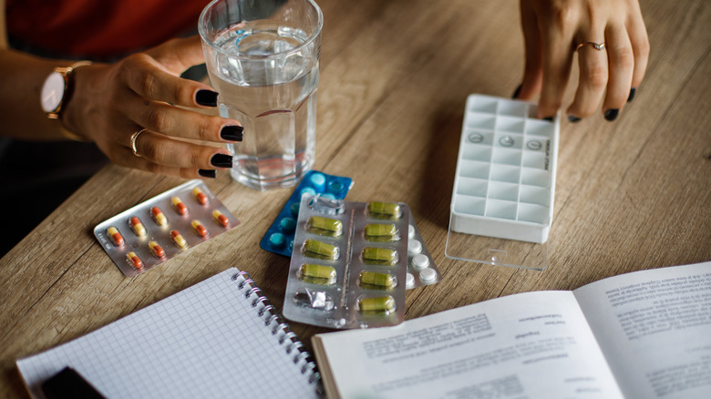 Person organizing medications