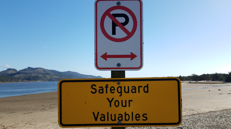 beach sign about valuables