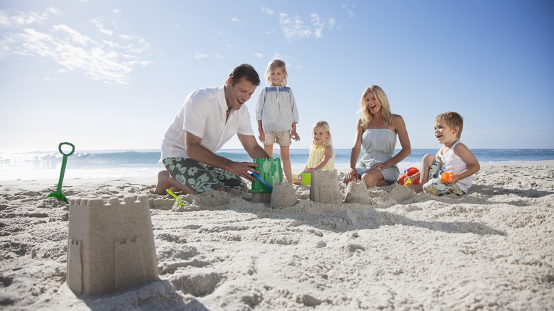 Family building sand castlesB