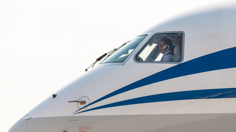 Exterior of pilot in cockpit 