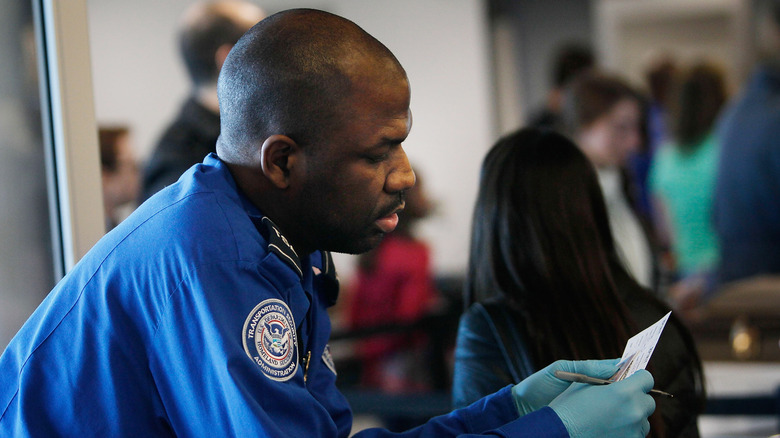 TSA officer checking ID