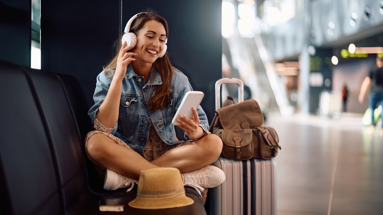 woman listening to music with headphones