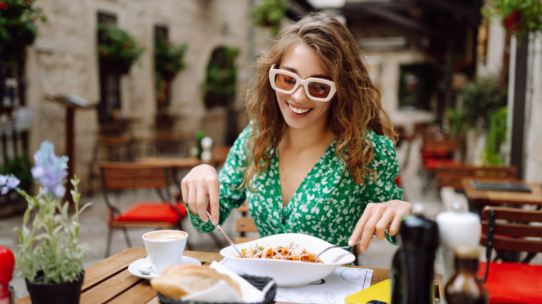 woman eating Italian food