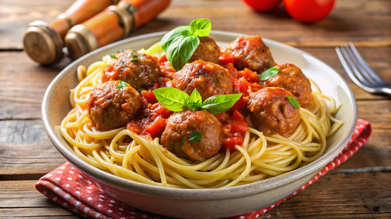 a bowl of spaghetti and meatballs