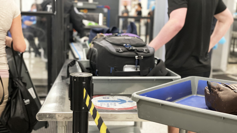 luggage at TSA checkpoint