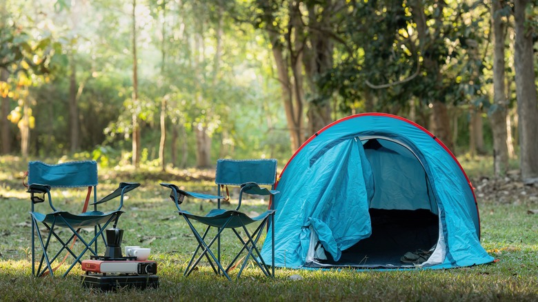 Tent and two camping chairs