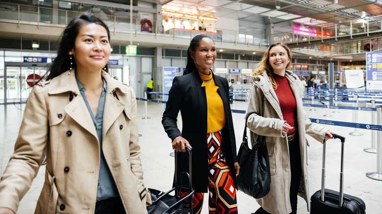 three women at airport