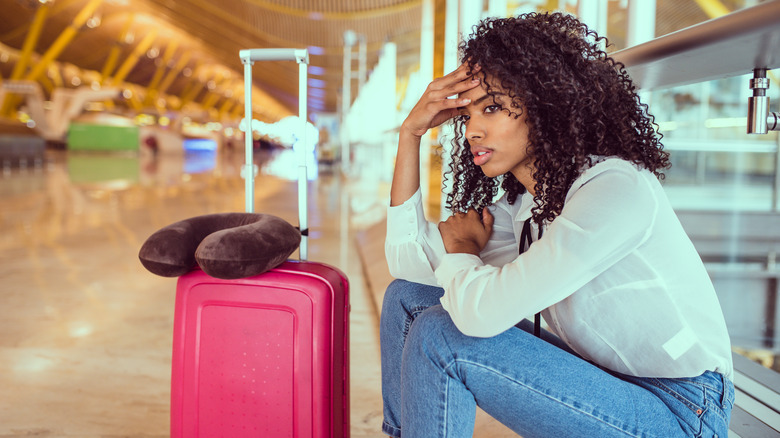 stressed woman at airport