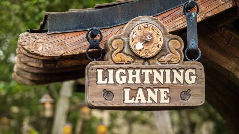 Wooden Disney Lightning Lane sign 