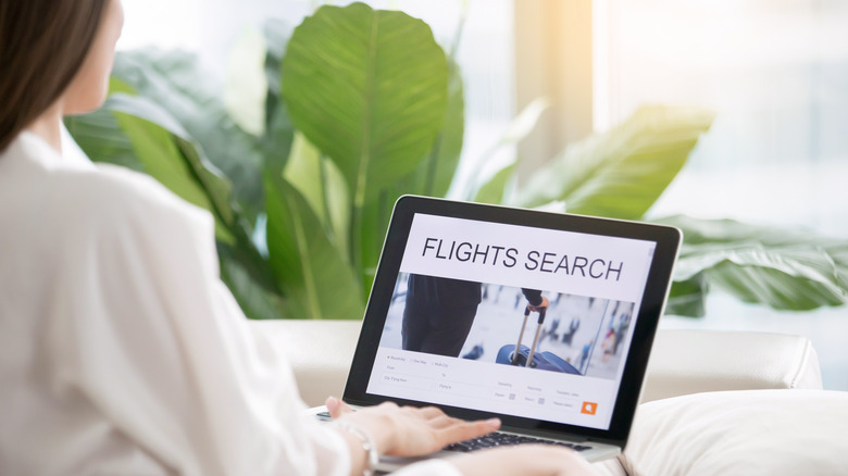 woman searching for flights