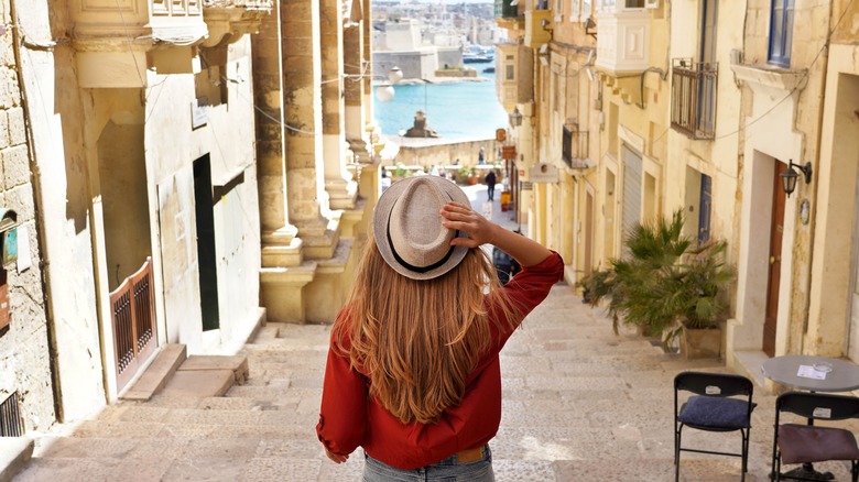 Girl walking European street