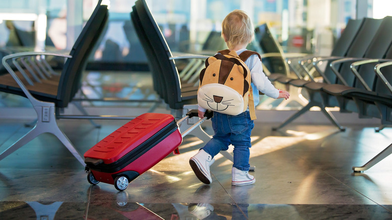 child with little backpack