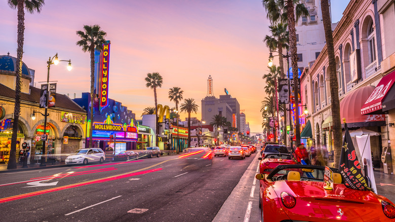 Neon lights shine on the Walk of Fame