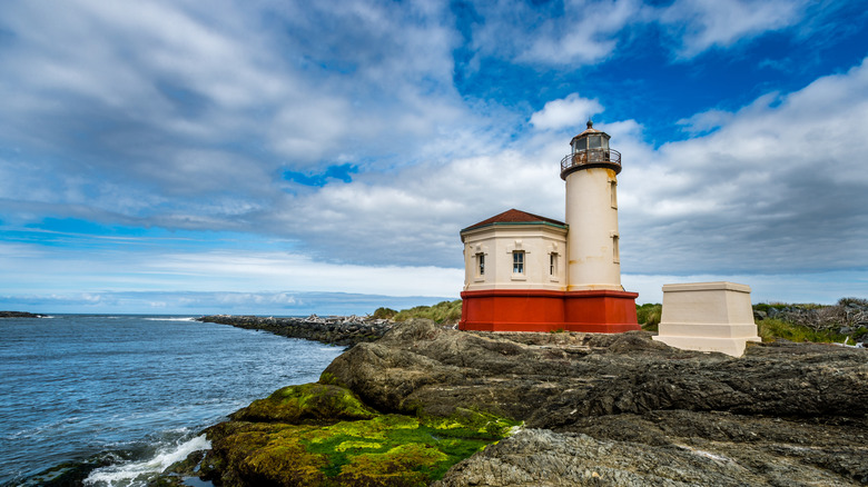 Coquille River Lighthouse is located along the rocky shoreline.